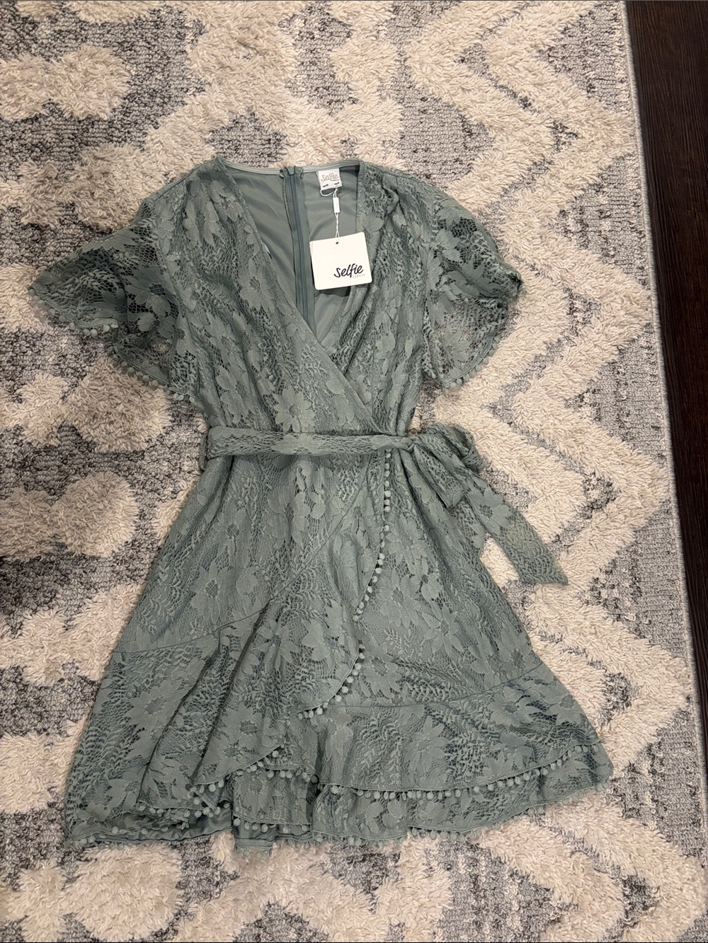 Selfie Leslie Sage Green Lace Wrap Dress with Pom Trim